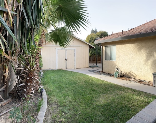 3854 Canvasback Ct, Merced, CA 95340 - view of grassy yard with a storage unit
