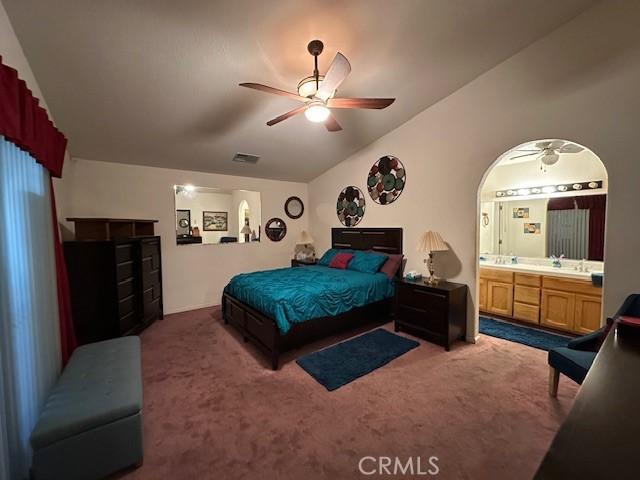 3854 Canvasback Ct, Merced, CA 95340 - bedroom featuring carpet flooring, ensuite bath, ceiling fan, vaulted ceiling, and arched walkways