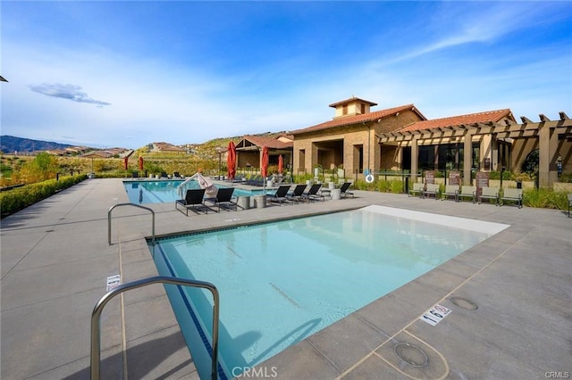 11937 Wandering Way, Corona, CA 92883 - community pool with a pergola and a patio area