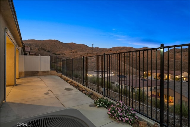 11937 Wandering Way, Corona, CA 92883 - fenced backyard featuring a mountain view and a patio area