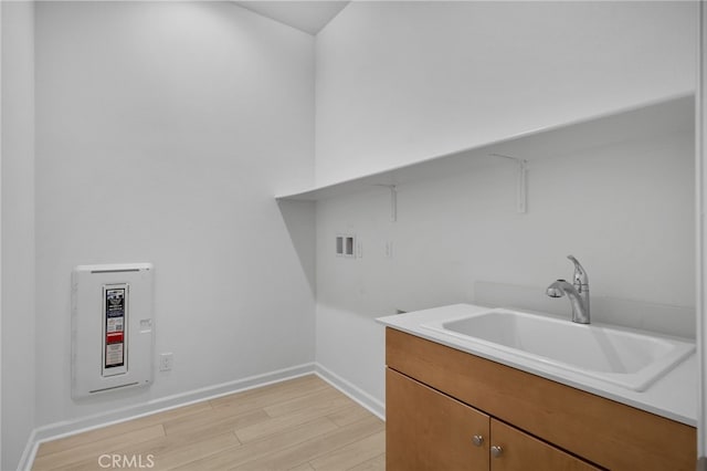 11937 Wandering Way, Corona, CA 92883 - washroom featuring hookup for a washing machine and light wood-type flooring