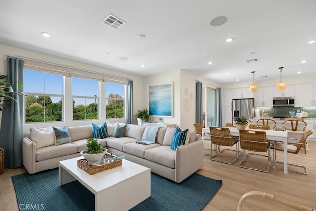 12247 Elliott Ave Unit C, El Monte, CA 91732 - living room featuring light wood-style flooring and recessed lighting