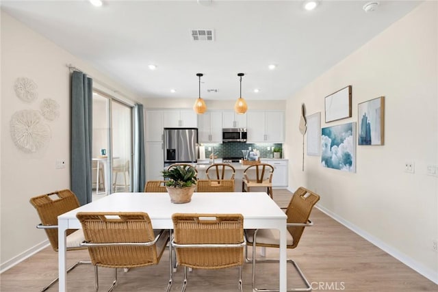 12247 Elliott Ave Unit C, El Monte, CA 91732 - dining space with recessed lighting and light wood-type flooring