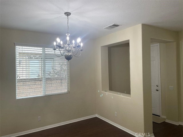 629 E Gardenia Dr, Azusa, CA 91702 - spare room with a chandelier and wood finished floors