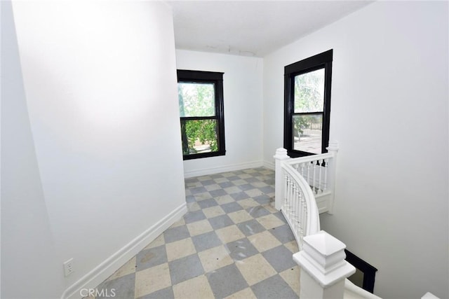 724 W 2nd St, Pomona, CA 91766 - hallway featuring an upstairs landing and light floors