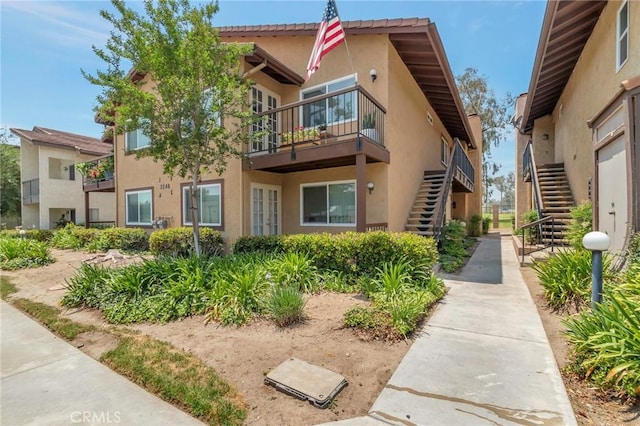 3246 Little Mountain Dr Unit D, San Bernardino, CA 92405 - view of building exterior featuring stairway