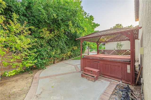 44118 Ruthron Ave, Lancaster, CA 93536 - view of patio / terrace featuring a hot tub and a gazebo