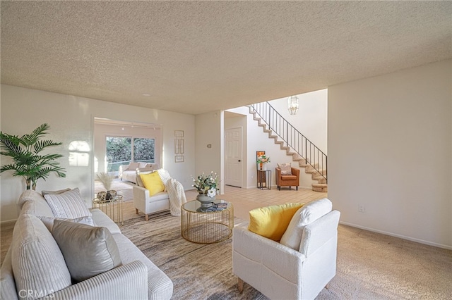 44118 Ruthron Ave, Lancaster, CA 93536 - living area with stairs, a textured ceiling, and light colored carpet