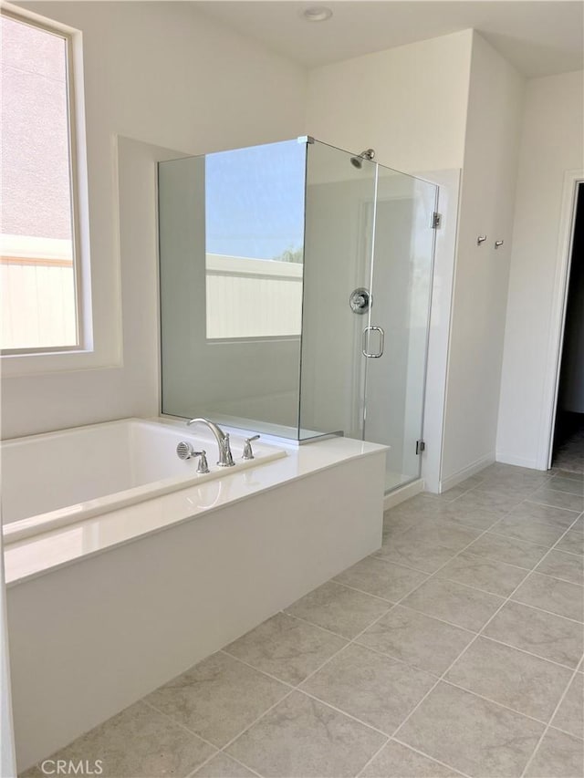 17727 Santa Lucia Ct, Riverside, CA 92503 - bathroom featuring a shower stall, a bath, and tile patterned flooring
