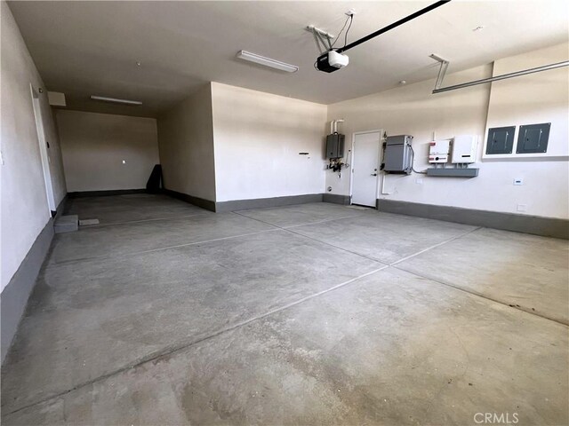 17727 Santa Lucia Ct, Riverside, CA 92503 - garage with a garage door opener, electric panel, and water heater