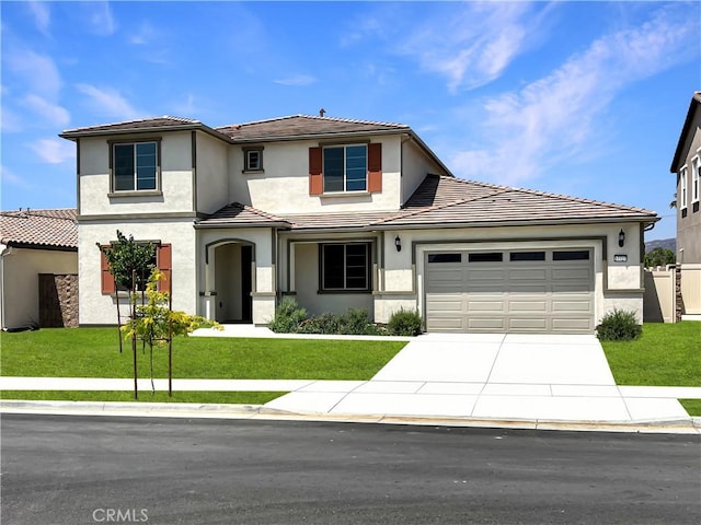 17727 Santa Lucia Ct, Riverside, CA 92503 - view of front of house featuring a garage, driveway, a tiled roof, and stucco siding