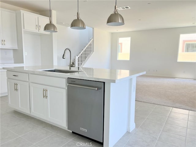 17727 Santa Lucia Ct, Riverside, CA 92503 - kitchen with dishwasher, open floor plan, light tile patterned floors, and healthy amount of natural light