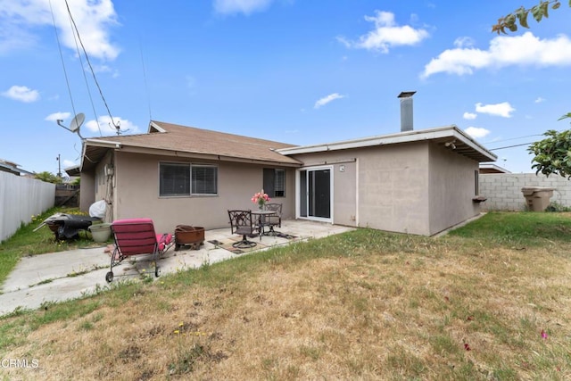 1904 N 7th St, Port Hueneme, CA 93041 - back of house with a patio area, stucco siding, and roof with shingles