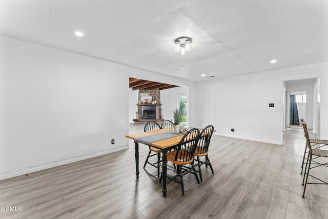 1904 N 7th St, Port Hueneme, CA 93041 - dining space with a brick fireplace, light wood-style flooring, and recessed lighting