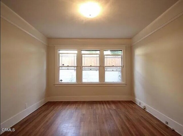 1165 N Lake Ave, Pasadena, CA 91104 - spare room featuring healthy amount of natural light and dark wood-type flooring