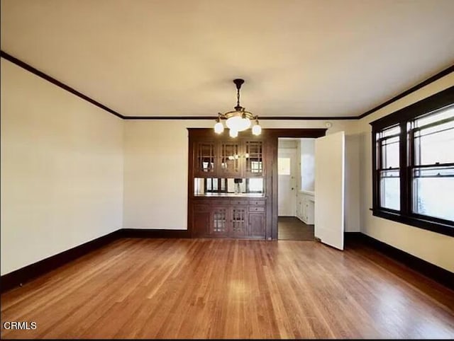 1165 N Lake Ave, Pasadena, CA 91104 - unfurnished living room with crown molding and wood finished floors