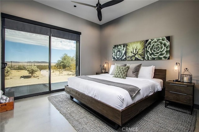 6640 Mount Shasta Ave, Joshua Tree, CA 92252 - bedroom featuring access to exterior, finished concrete flooring, and ceiling fan