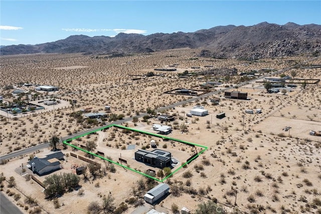 6640 Mount Shasta Ave, Joshua Tree, CA 92252 - aerial view of sparsely populated area with a mountainous background and property parcel outlined