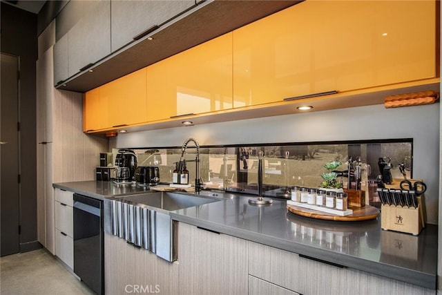 6640 Mount Shasta Ave, Joshua Tree, CA 92252 - kitchen with dishwasher, concrete floors, and modern cabinets