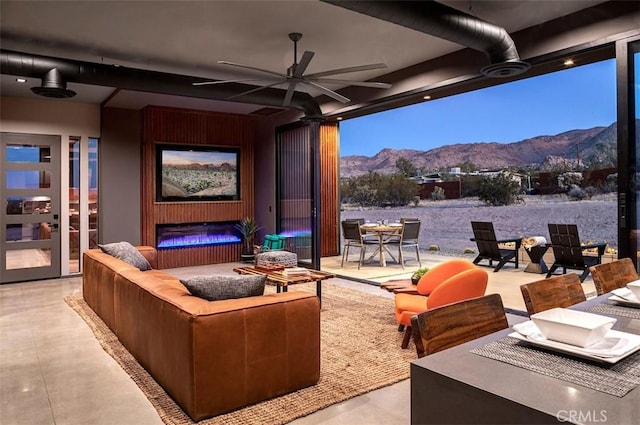 6640 Mount Shasta Ave, Joshua Tree, CA 92252 - view of patio / terrace with a mountain view, ceiling fan, outdoor dining area, and an outdoor hangout area