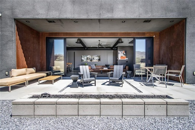 6640 Mount Shasta Ave, Joshua Tree, CA 92252 - view of patio featuring an outdoor living space with a fire pit
