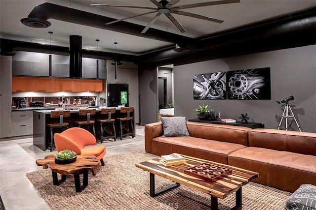 6640 Mount Shasta Ave, Joshua Tree, CA 92252 - living area with ceiling fan and concrete flooring