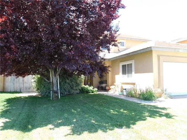 12405 Firefly Way, Victorville, CA 92392 - view of home's exterior with stucco siding