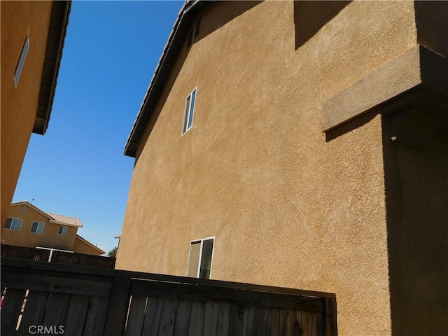 12405 Firefly Way, Victorville, CA 92392 - view of side of home with stucco siding
