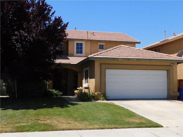 12405 Firefly Way, Victorville, CA 92392 - traditional-style home with stucco siding, driveway, a front yard, an attached garage, and a tile roof