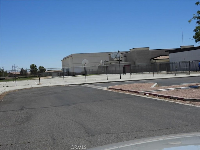 12405 Firefly Way, Victorville, CA 92392 - view of asphalt road featuring curbs