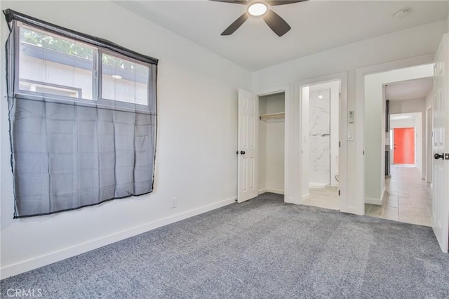 1964 E 114th St, Los Angeles, CA 90059 - unfurnished bedroom featuring carpet flooring, ensuite bathroom, and ceiling fan
