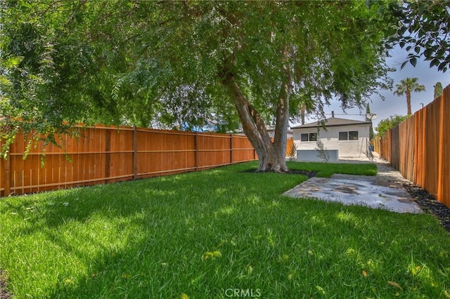 1964 E 114th St, Los Angeles, CA 90059 - fenced backyard featuring a patio area