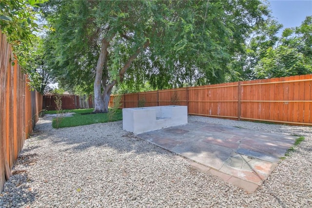 1964 E 114th St, Los Angeles, CA 90059 - fenced backyard with a patio