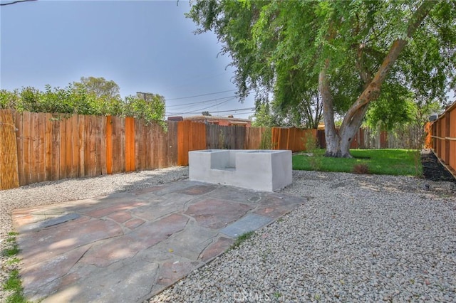 1964 E 114th St, Los Angeles, CA 90059 - fenced backyard with a patio area
