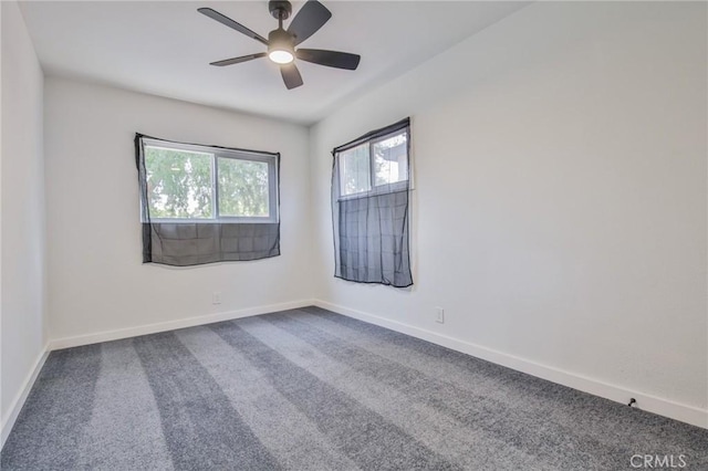 1964 E 114th St, Los Angeles, CA 90059 - unfurnished room with dark carpet and a ceiling fan