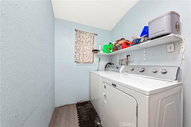 38847 2nd St E, Palmdale, CA 93550 - laundry room with washing machine and clothes dryer, wood finished floors, and a textured wall