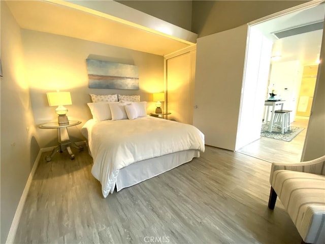 1441 Monterey Rd Unit M2-61J, Seal Beach, CA 90740 - bedroom featuring wood finished floors and a closet