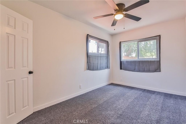1962 E 114th St, Los Angeles, CA 90059 - unfurnished room with dark carpet and a ceiling fan