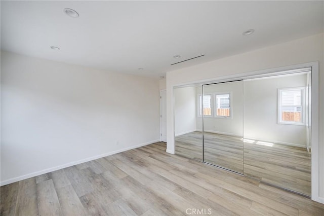 1038 N Columbus Ave, Glendale, CA 91202 - unfurnished bedroom with light wood-style floors and a closet