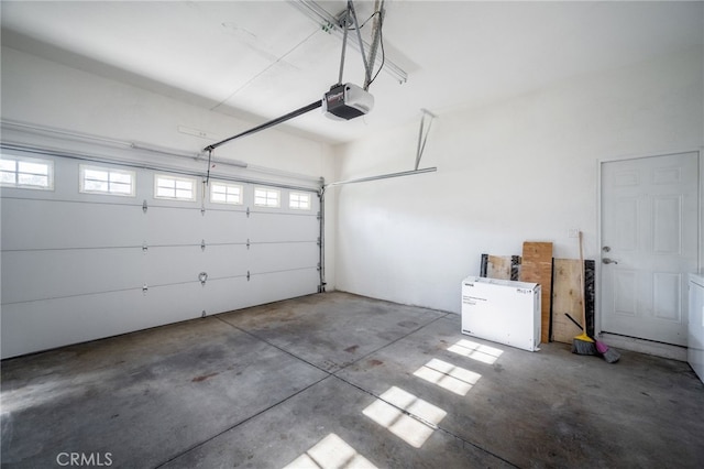 1038 N Columbus Ave, Glendale, CA 91202 - garage with fridge and a garage door opener