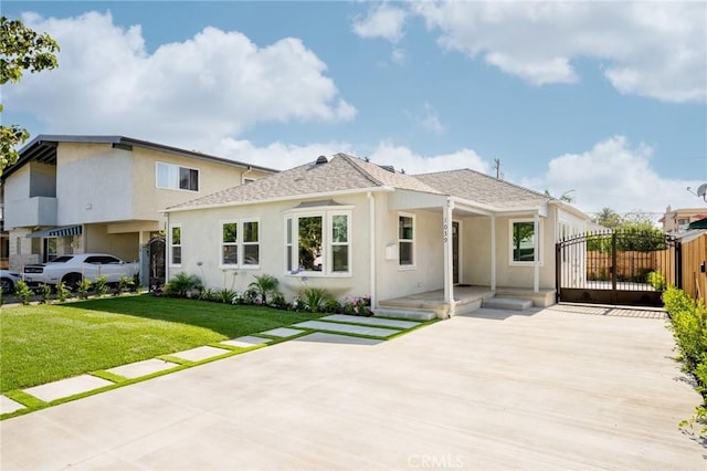1038 N Columbus Ave, Glendale, CA 91202 - back of property featuring stucco siding and a shingled roof