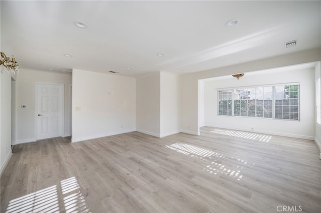 1038 N Columbus Ave, Glendale, CA 91202 - unfurnished living room with light wood finished floors and recessed lighting