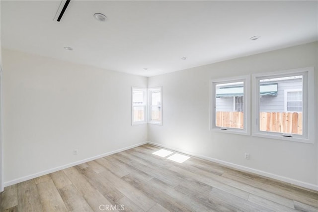1038 N Columbus Ave, Glendale, CA 91202 - empty room with light wood-style flooring, plenty of natural light, and recessed lighting