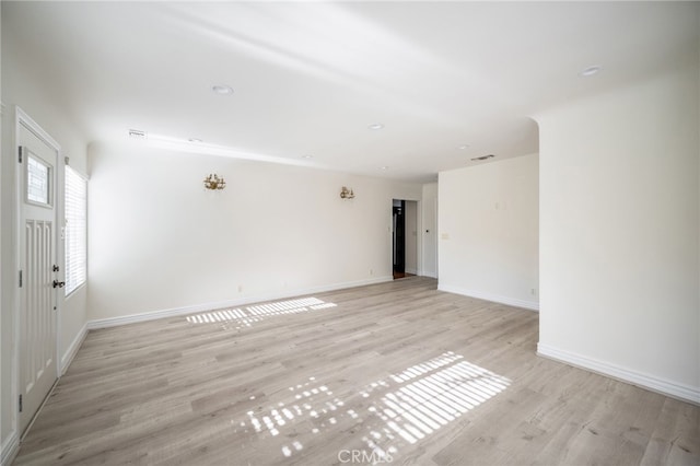 1038 N Columbus Ave, Glendale, CA 91202 - unfurnished room with baseboards and light wood-style flooring