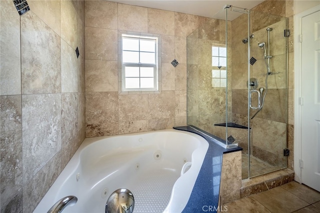 1038 N Columbus Ave, Glendale, CA 91202 - full bath with a shower stall, a jetted tub, and tile patterned flooring