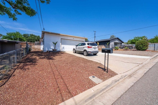 9181 Bloomdale St, Santee, CA 92071 - view of front of property featuring driveway and a garage