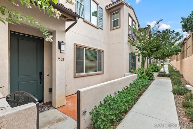 7508 Eagle Dr, Santee, CA 92071 - property entrance with stucco siding