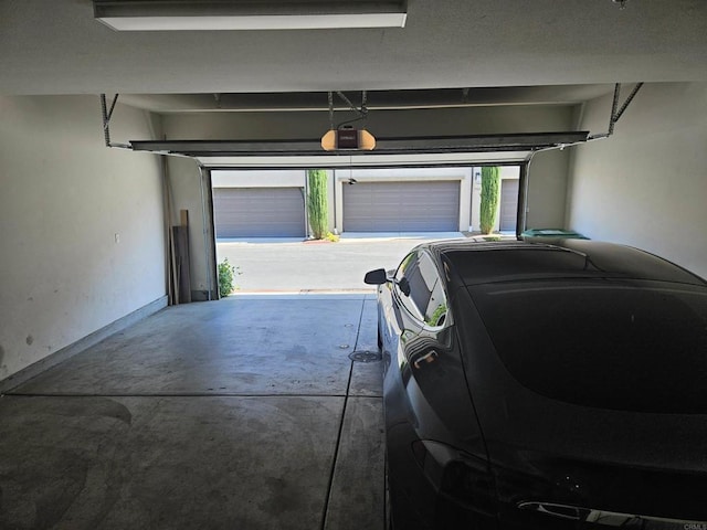 7508 Eagle Dr, Santee, CA 92071 - garage featuring a garage door opener