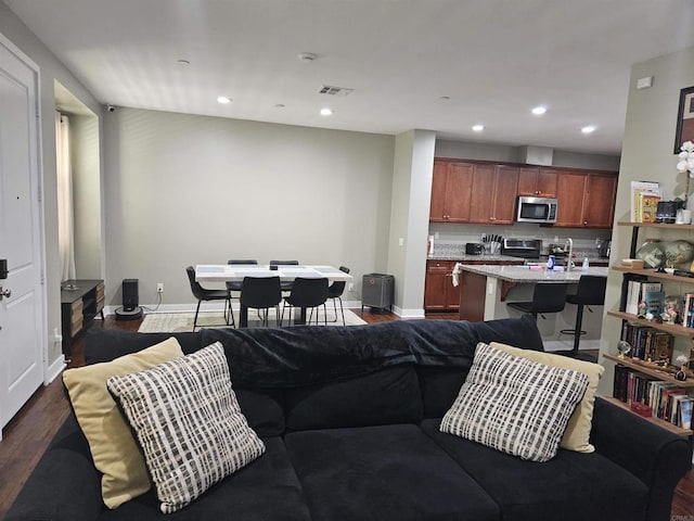7508 Eagle Dr, Santee, CA 92071 - living room featuring dark wood-style flooring and recessed lighting