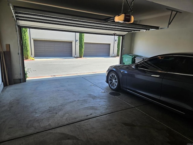 7508 Eagle Dr, Santee, CA 92071 - garage featuring a garage door opener